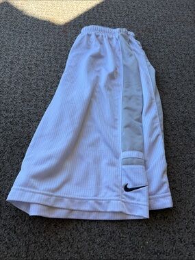 Nike White Athletic Shorts with Gray Side Panel and Black Swoosh